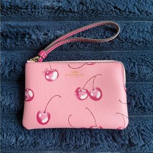Coach Pink Wristlet with Cherry Design